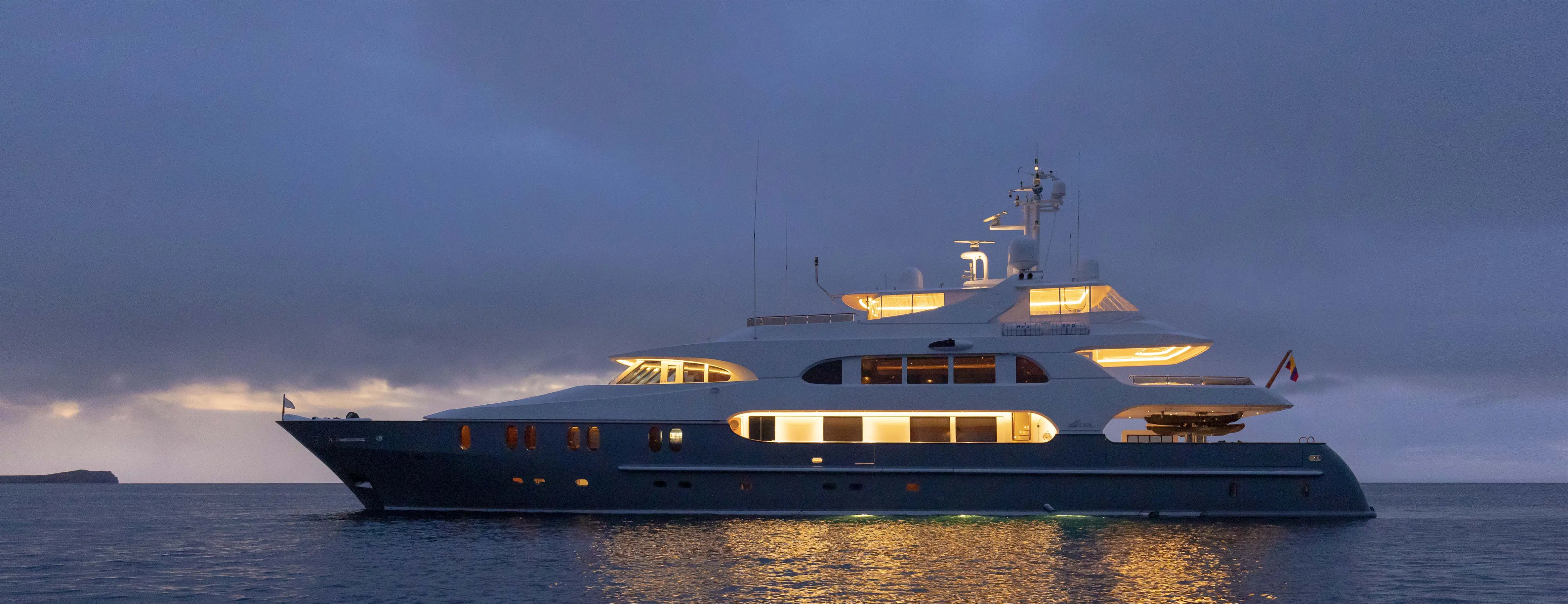 Aqua Mare yacht on the water at dusk
