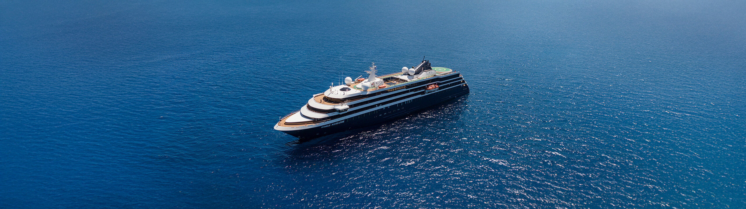 World Navigator expedition yacht sailing across blue water